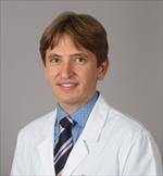This is an image of Arnold Sipos, MD, PhD, Click here to see their profile
