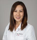 This is an image of May Anne Kim-Tenser, MD, Click here to see their profile