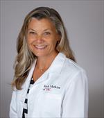 This is an image of Christianne Norton Heck, MD, MMM, Click here to see their profile