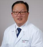This is an image of John L. Go, MD, Click here to see their profile