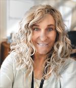Photo of Suellen Miller, PhD, MHA, CNM