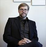 Photo of Dyche Mullins, PhD